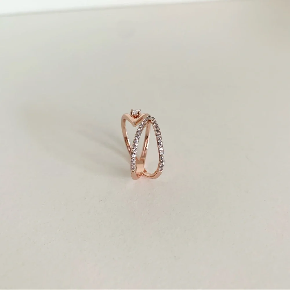 NWOT Rose gold X ring